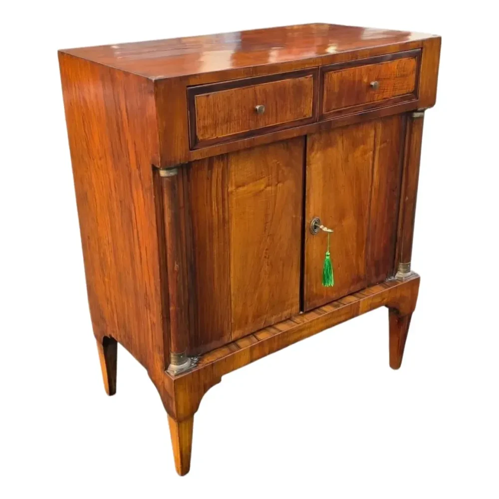 American Classical Figured Flame Mahogany Two-Drawer Cabinet With Brass-Mounted Columns, Circa 1840